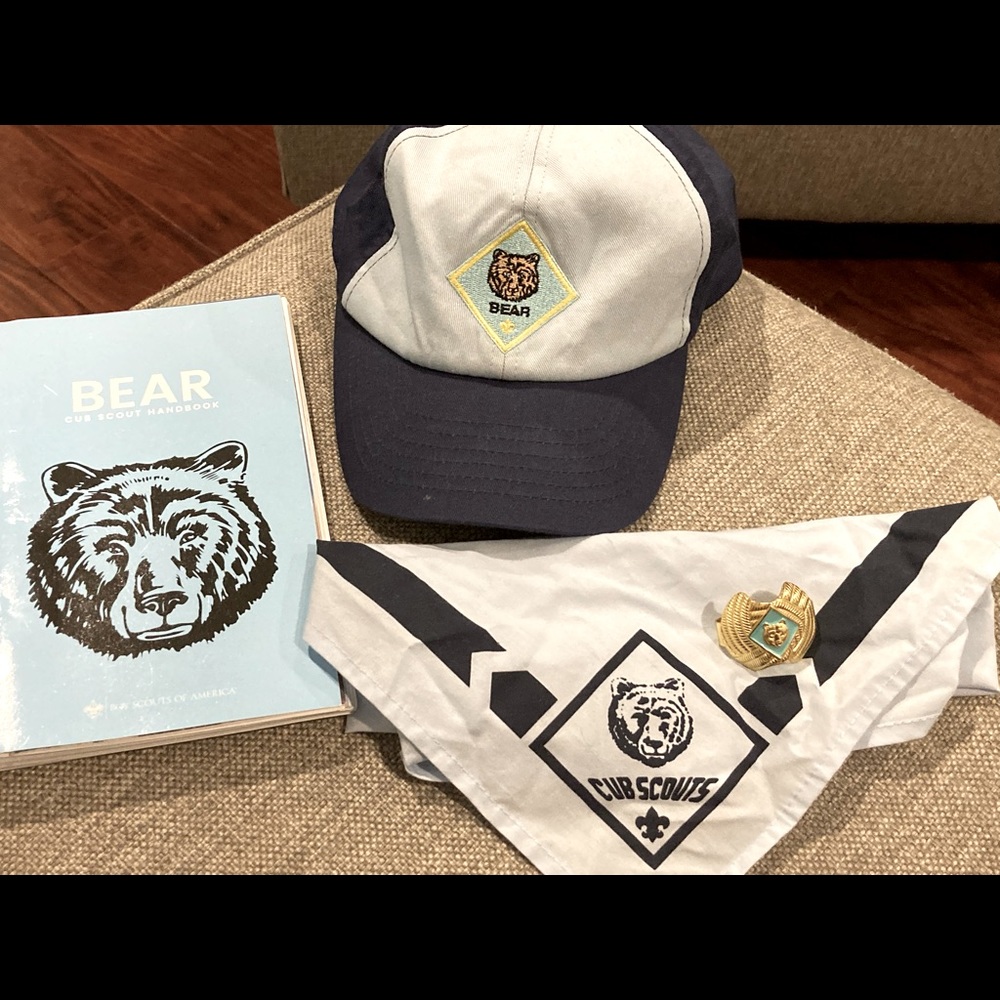 Bear Cub Scout hat, neckerchief, slide and handbook